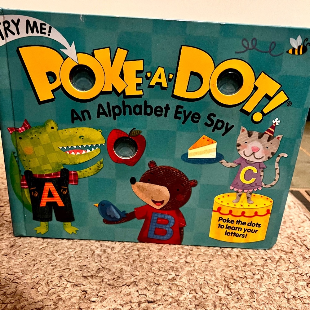 Poke a dot book, Melissa & Doug.  An alphabet eye-spy.
